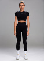 A model wears the Sassy Sportswear Crop Top Comfy Cotton in the Cloudy Grey color