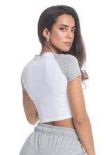 A model wears the Sassy Sportswear Crop Top Comfy Cotton in the Cloudy Grey color
